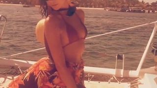 Sarah Hyland on a boat in a sexy bikini top