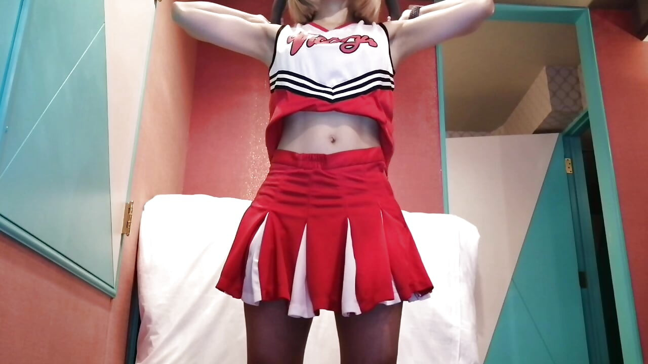 A cute, busty married woman does five exercises in a sexy cheerleader costume. Peeking down from below. Home made amateur Private Shoot