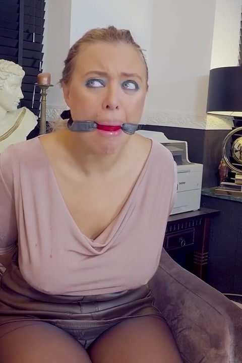 Beth Tied up and Gagged Tape Bondage and in BDSM Completely Weak