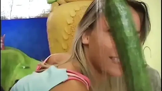 Lesbians Friends Play with a Cucumber