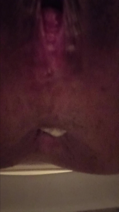 Pushing his cum out my ass