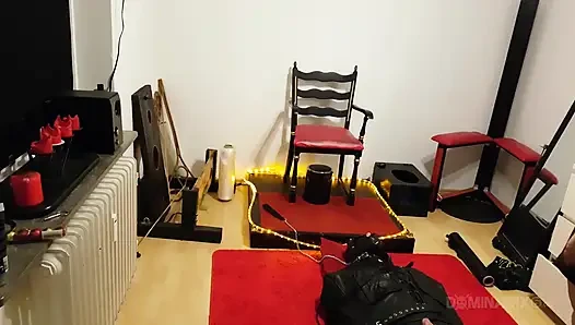 Curvy Brunette Dominatrix Commands Bound Slave in Fetish Dungeon