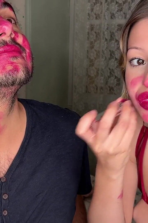 Non Stop Lipstick Kisses All Over His Face