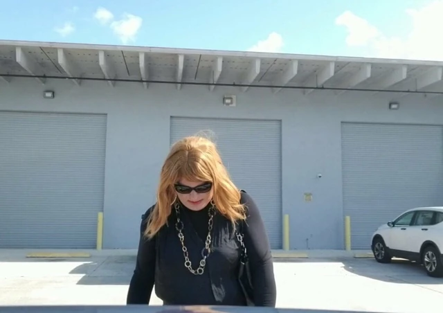 Tranny smoking leaving the adult theater