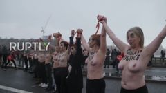 Topless activists block London Bridge