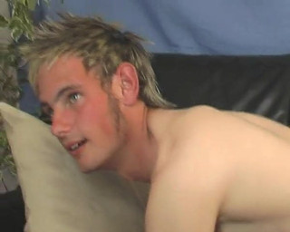 blond hunk playing with him self on the sofa