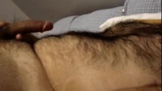 Cumming on a hairy chest