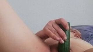 Milf fingering and using cucumber