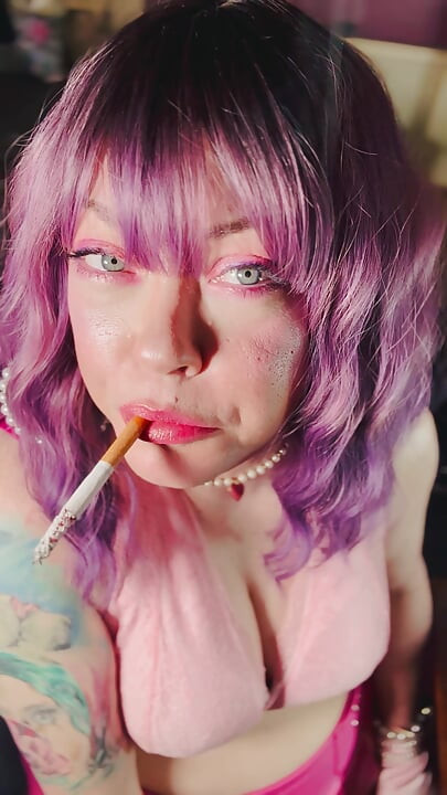 A Cute Tina Snua Tip To Tails 2 Cigarettes With Lots Of Smoke Rings In Satin Gloves & Jewellery