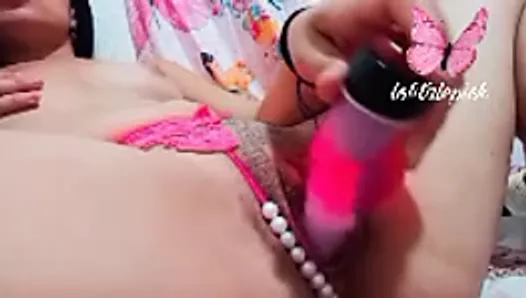 touches herself and masturbates with her dildo