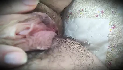 A village girl beautifully pulls her hairy pussy to beautiful music