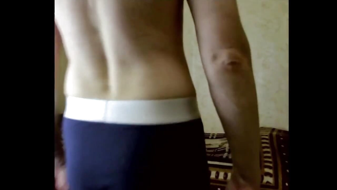 A guy with an imperfect body twirls in front of the camera in different outfits and shows his underwear.