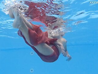 Hottest milf strips underwater