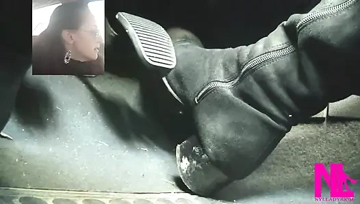 Mengemudi cepat dengan sepatu bot tinggi suede knee hitam