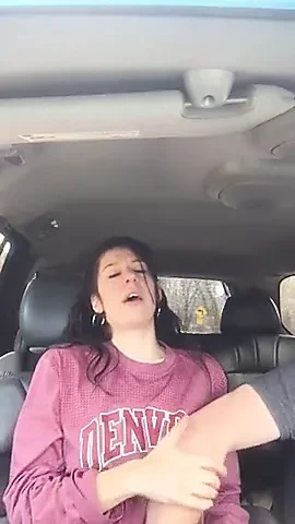 Very cute chick gets fingered to orgasm in back seat