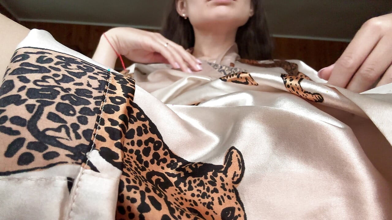 Wearing a short robe, I take off my panties and masturbate my creamy pussy with a vibrator.