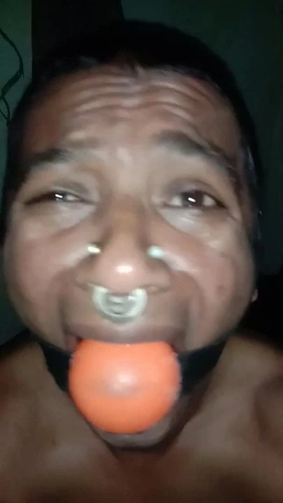 Ball gagged slave in pain