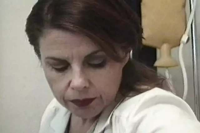 Horny nurse playing with blindfolded patient dick
