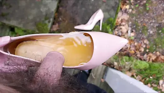 Piss in pink stiletto high heel