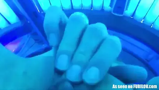 Hot Babe Plays With Her Pussy In A Tanning Bed