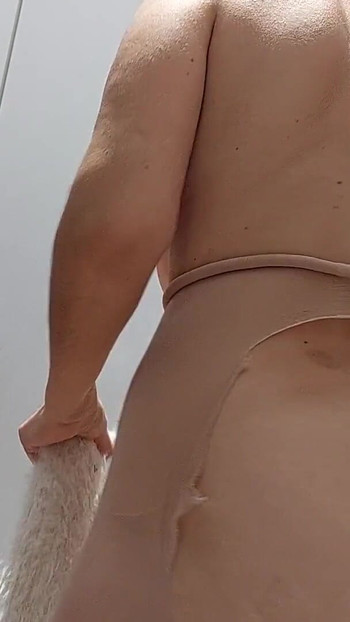 Stunning moment from "Amateur milf pussy, big ass, big tits. Sexy mom tries on pantyhose."