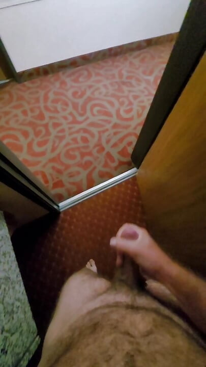 Stroking my cock in cedar rapids hotel with door open in front of camera.
