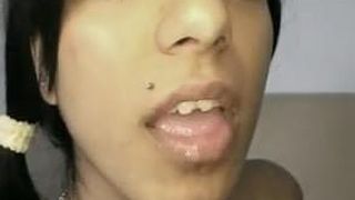 Pretty eyed Indian Suravinda takes a load in her mouth
