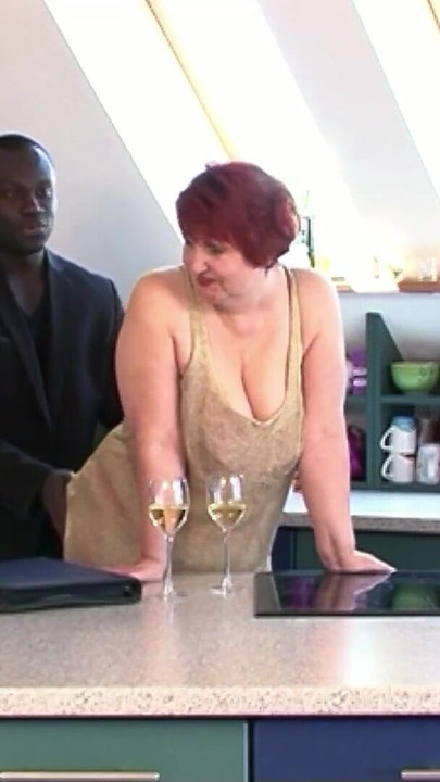 Thrilling moment from "German Busty Mature Granny Seduced Black Guy To Fuck"