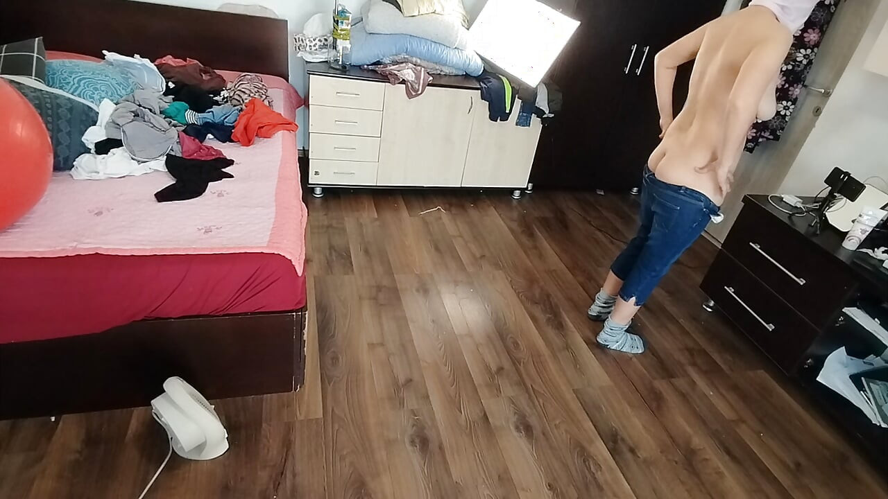 Amateur wife enjoys trying on clothes and cutting them.