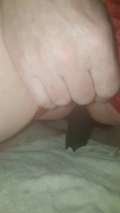 Riding a cucumber in tight red satin