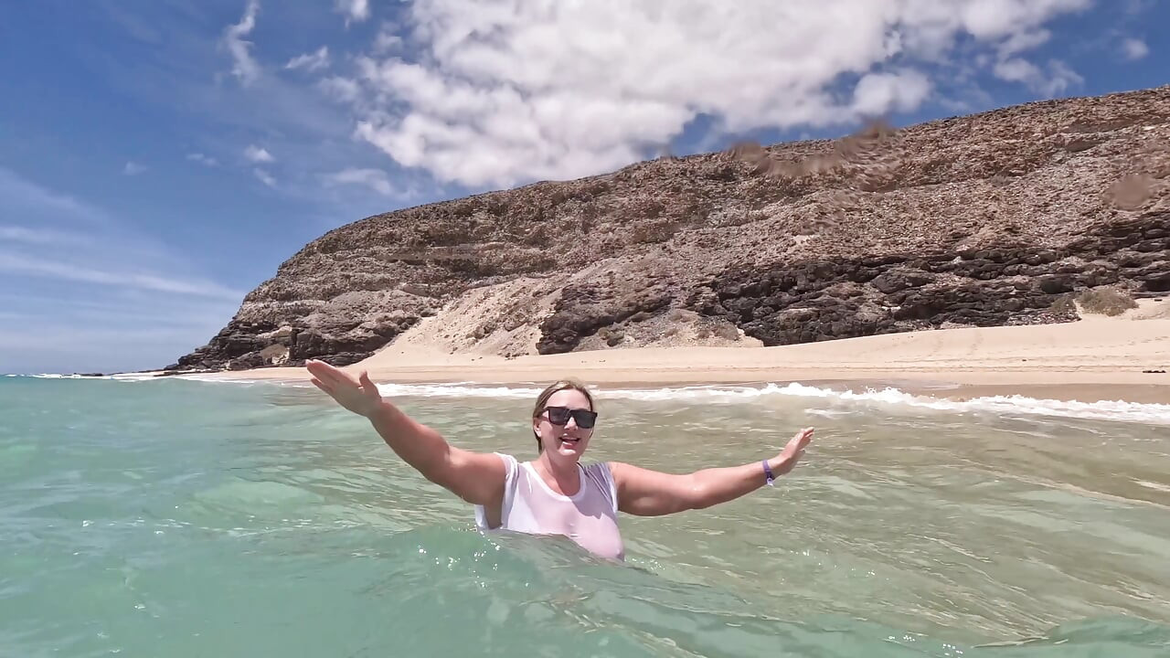 Girl Wetting Jeans in the Ocean and Swimming in Wet White T-shirt