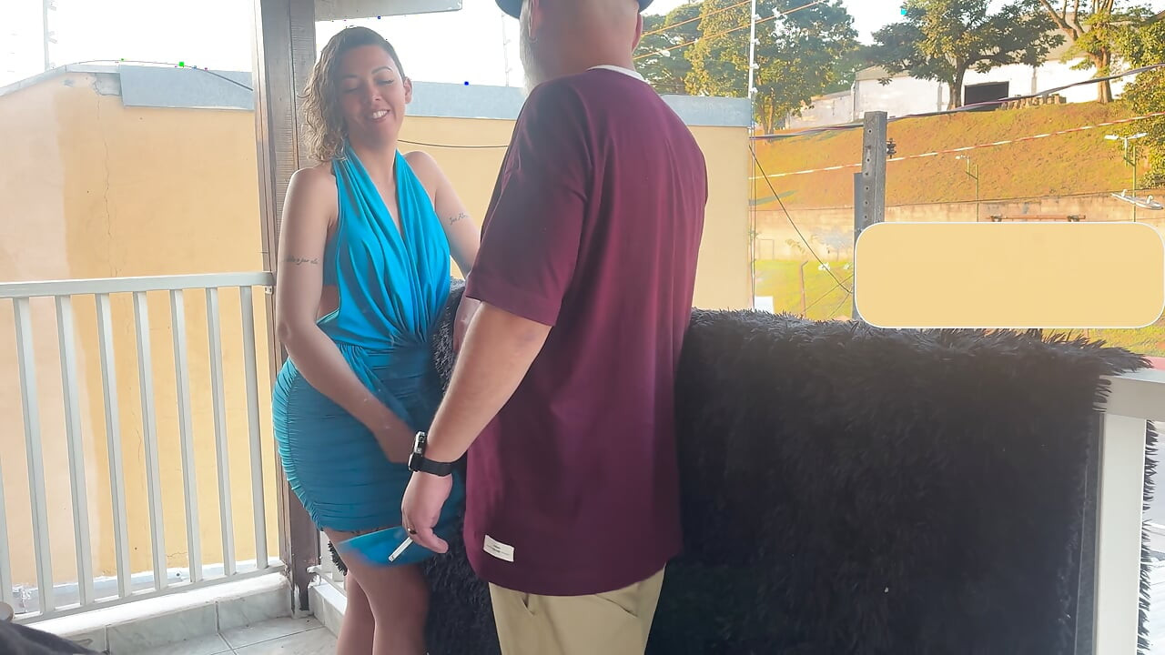 Strangers making out on a balcony during the party.