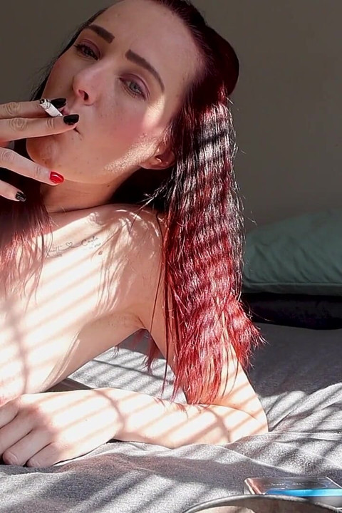 Nude Smoking on the Bed