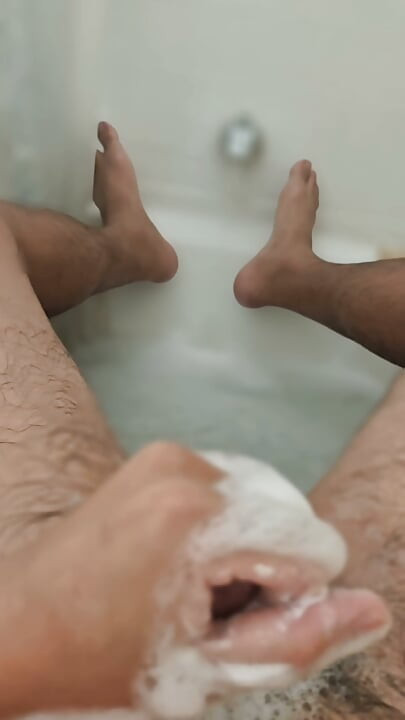 Cleaning Up in the Tub Bathing Solo and Rinsing Off