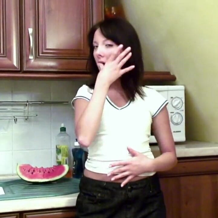 My stepsister playing with a melon