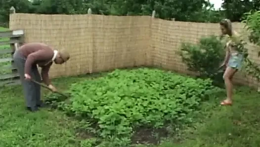 Dirty old man get his cock sucked by a young brunette in the garden
