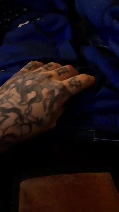 Tatted up guy strokes his cock