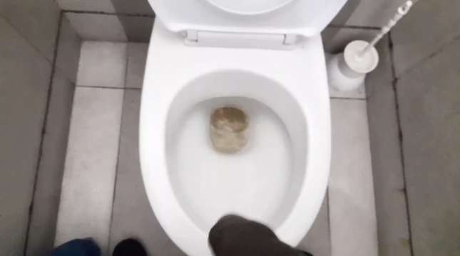 In the hotel bathroom, pissing hot and jerking off