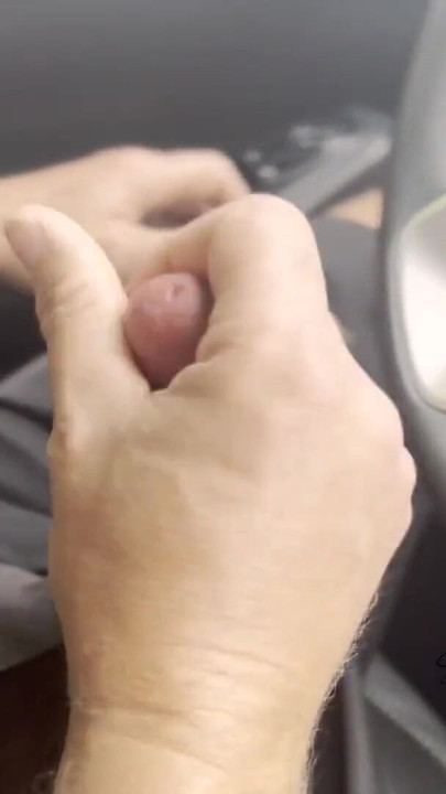 Key moment from "Cumming while driving, 2 closeup clit orgasms for her and a huge cum load for him"
