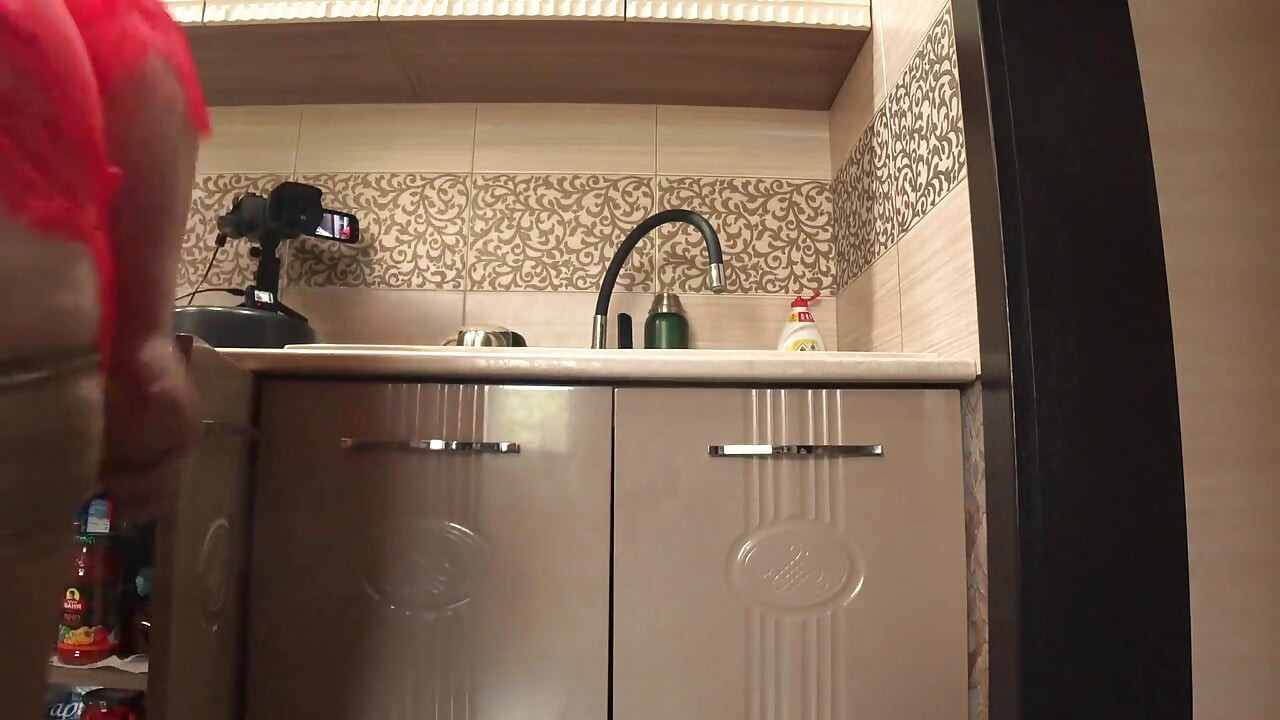 A Big Ass Under a Short Robe Close-up. My Mature Wife in the Kitchen.