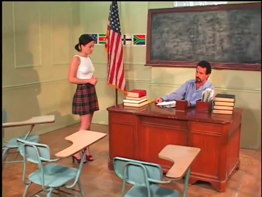 Hot ass chick on desk gets cum in mouth after hot fucking from teacher dude