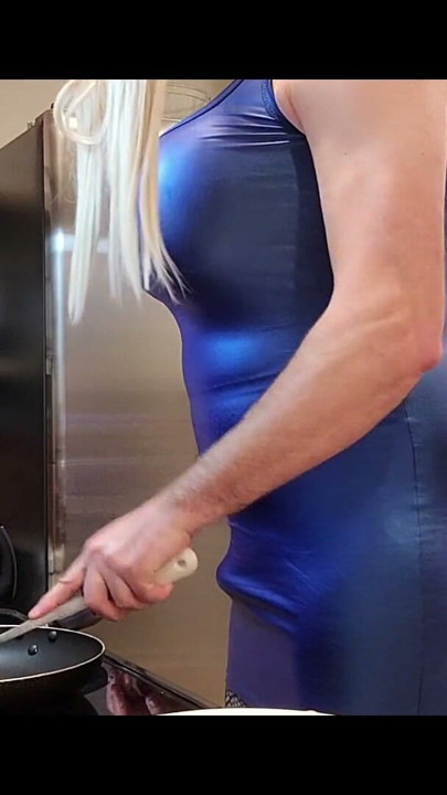 Gigantic fake tits crossdresser in tight dress making breakfast | Clip 1