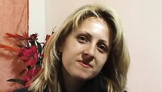 Busty blonde showing her body