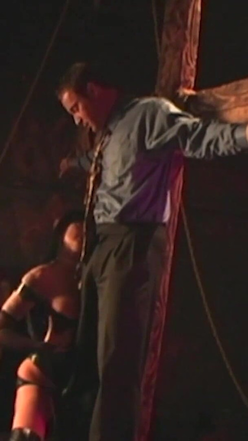 A voluptuous brunette places a guy on a cross and compels him to engage in sexual intercourse with her. | Clip 3