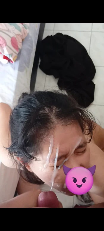 Squirting on Malay wife's face while she rides a dildo