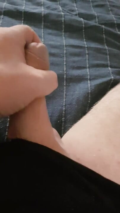 I lay and caress my cock and jerk off it longs