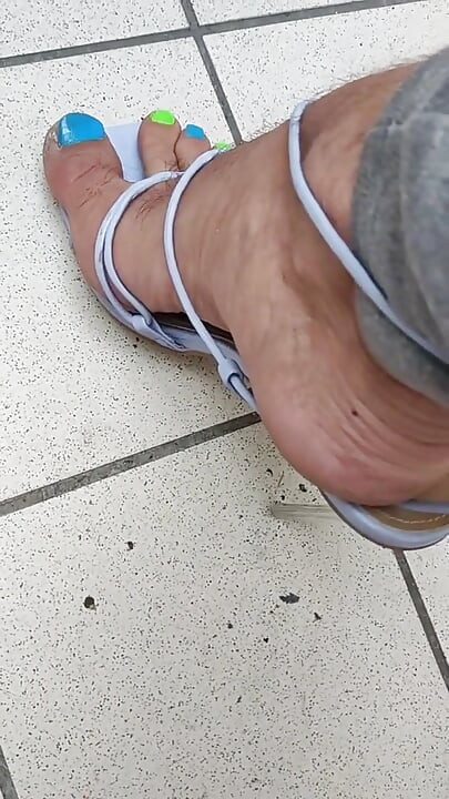 Sexy man feet in heels