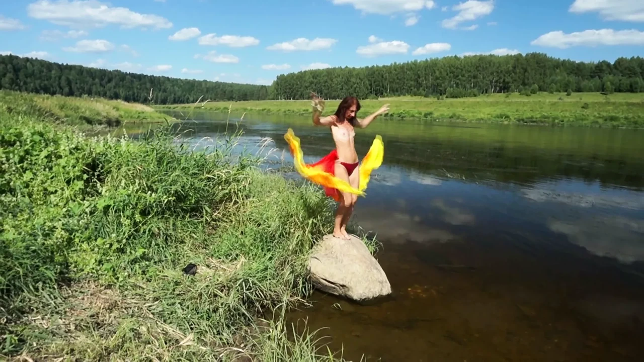 Color Fans on Boulder in Volga River