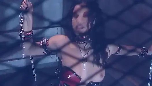Delivers a steamy blowjob to her slave's cock in a BDSM affair