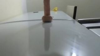 Horny and naughty having fun with a dildo